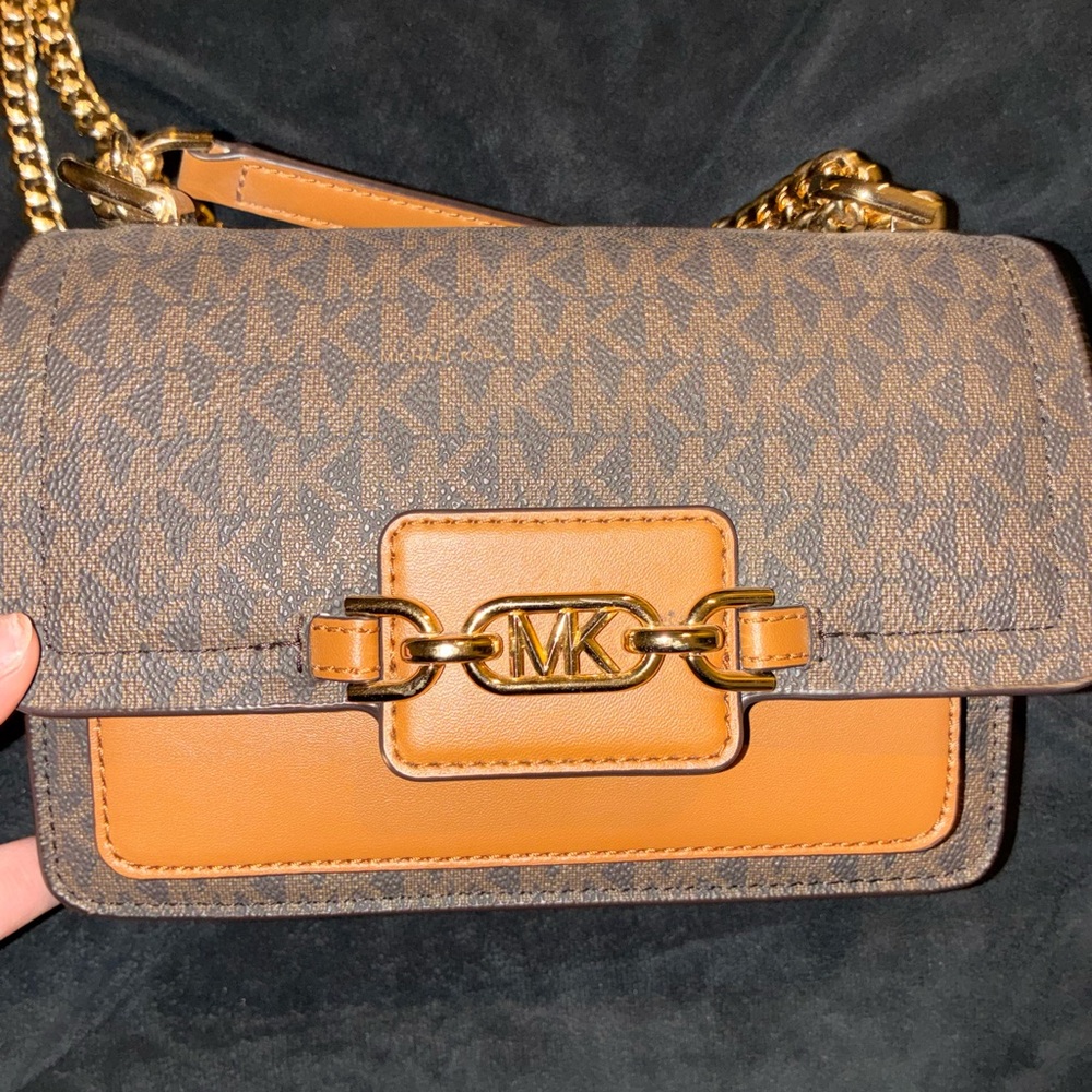 Elevate your style with this classy, Michael Kors bag